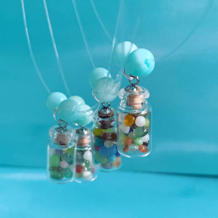 Various Stones Inside A Tiny Bottle Necklace With Amazonite