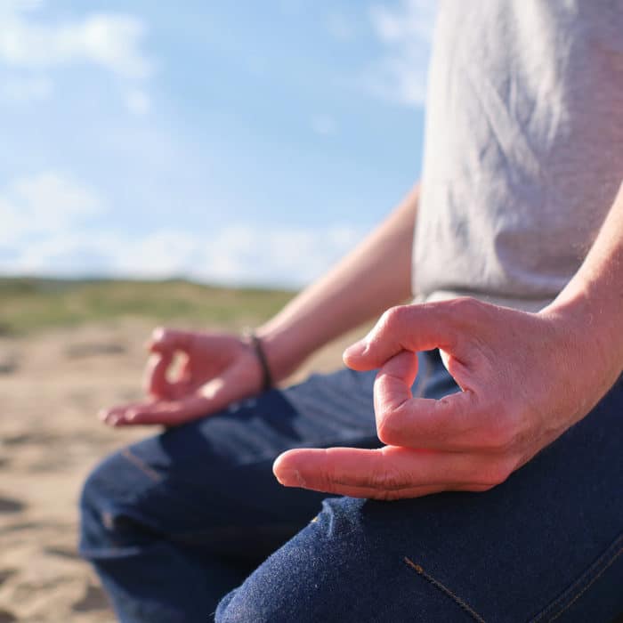 Person Meditating On The Sand, Blue Kyanite Meditation and Grounding