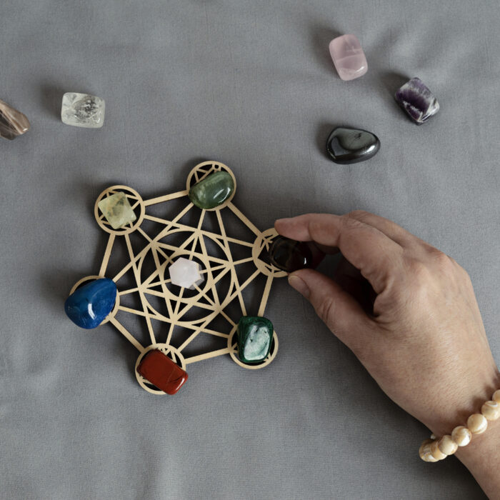 Healing chakra crystal grid therapy. Rituals with gemstones for wellness, healing, meditation, destress, relaxation, mental health, spiritual practices. Energetical power concept