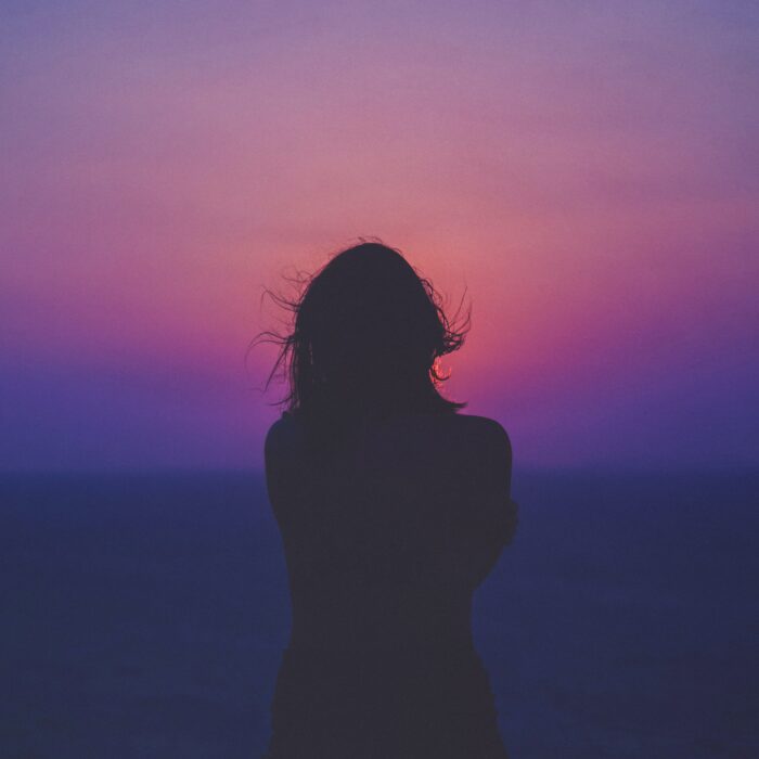 person silhouette purple
