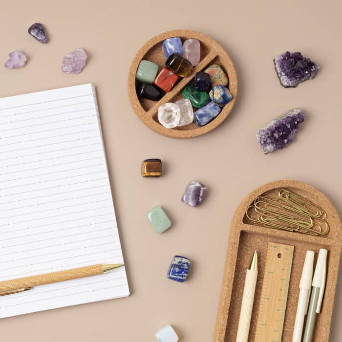 Healing chakra crystals and open organizer. Rituals with gemstones for career, wellness, concentration, business, destress, relaxation, mental health, spiritual practices. Energetical power concept