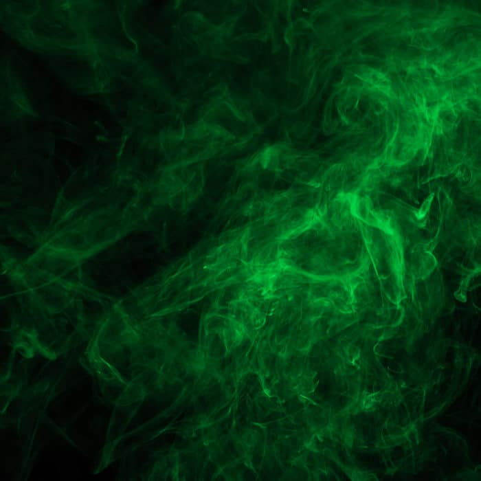 abstract background with green mystical smoke on black
