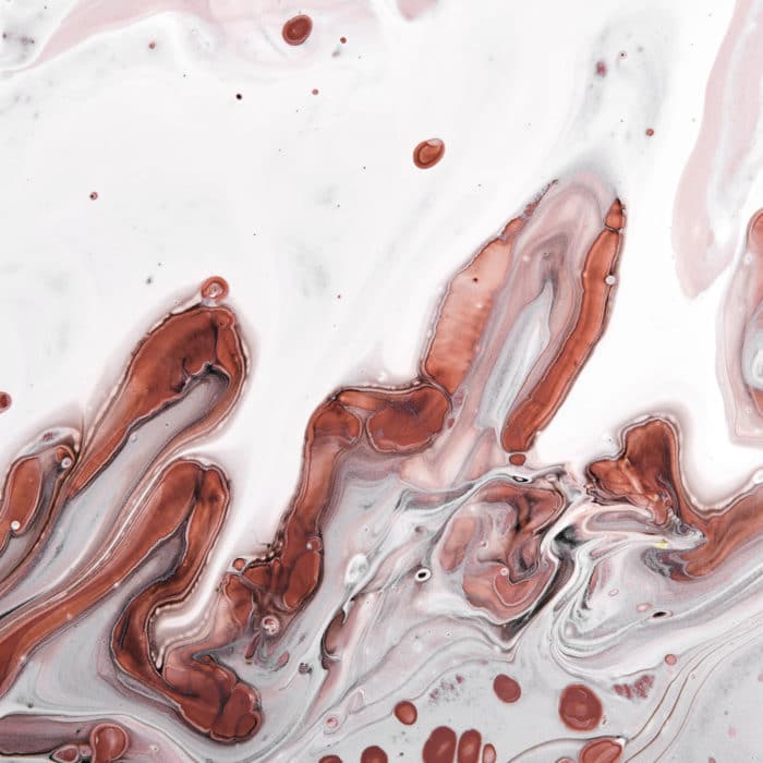 Acrylic Fluid Art. Brown and Gray waves and stains. Abstract marble agate stone background or texture