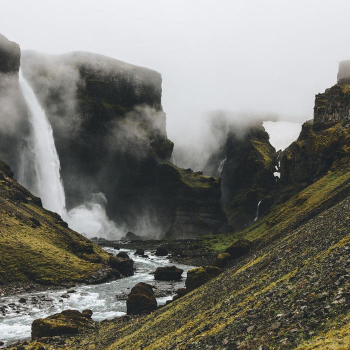 icelandic landscape with Haifoss waterfall on misty day