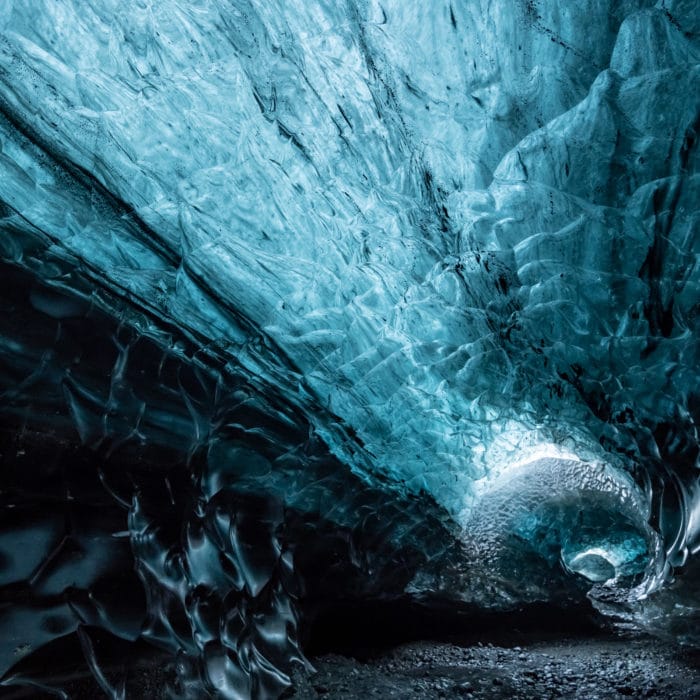 inside a glacier ice cave in iceland