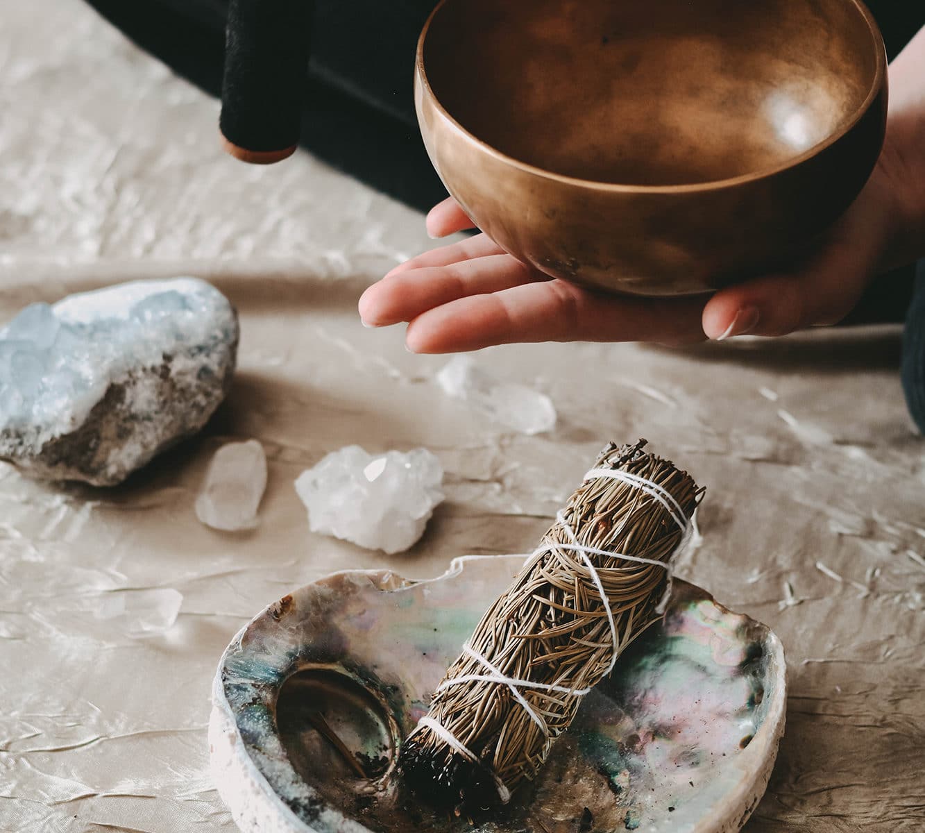 Crystal cleansing ritual, smudging, sound, and singing bowl