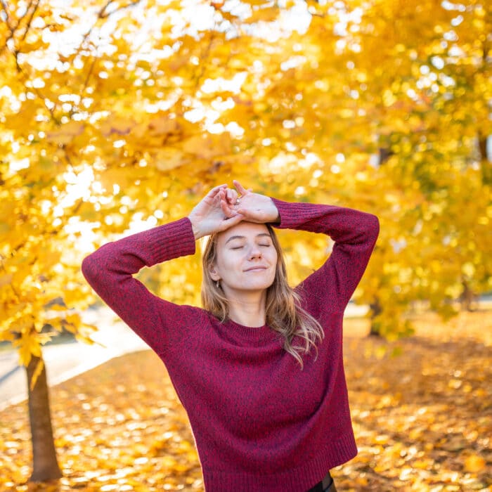 Happy girl with autumn background