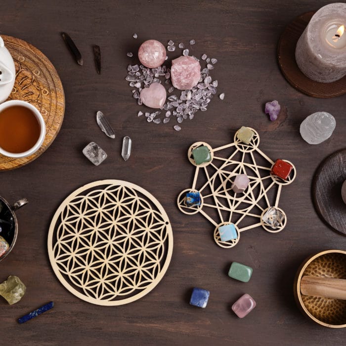 Healing chakra crystal grid therapy. Rituals with gemstones and aromatherapy for wellness, healing, meditation