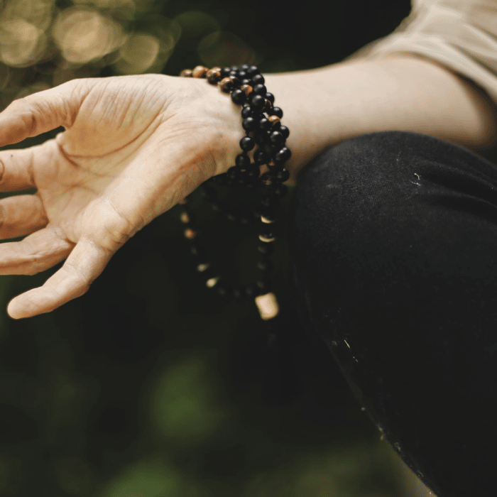 meditation with black amber beads