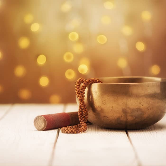 Singing bowl and sandalwood rosary. Buddhism and meditation concept