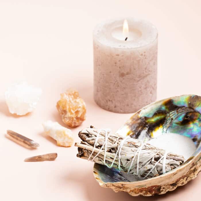 Smudge kit with white sage, palo santo, abalone shell. Natural elements for cleansing negative energy