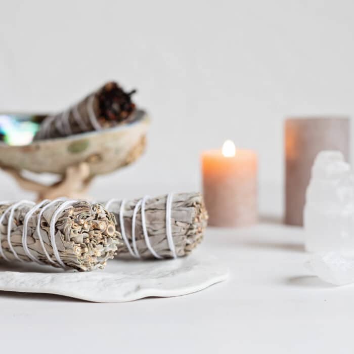 Smudge kit with white sage stick, abalone sea shell. Natural elements for cleansing environment from negative energy, adding positive vibes. Spriritual practices, witchcraft concept