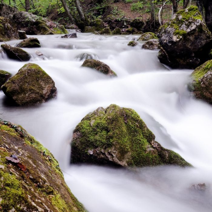stream with waterfall and mossy stones around 2021 08 28 03 47 45 utc