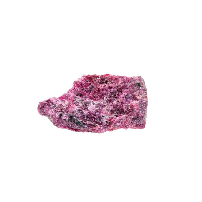 Closeup of sample of natural mineral from geological collection - unpolished eudialyte rock isolated on white background