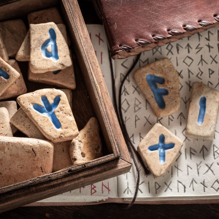 Vintage runic divination by stones made of Celtic language