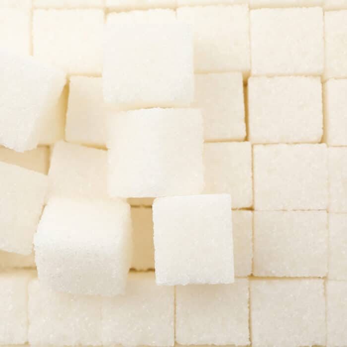 White sugar cubes texture background, close up