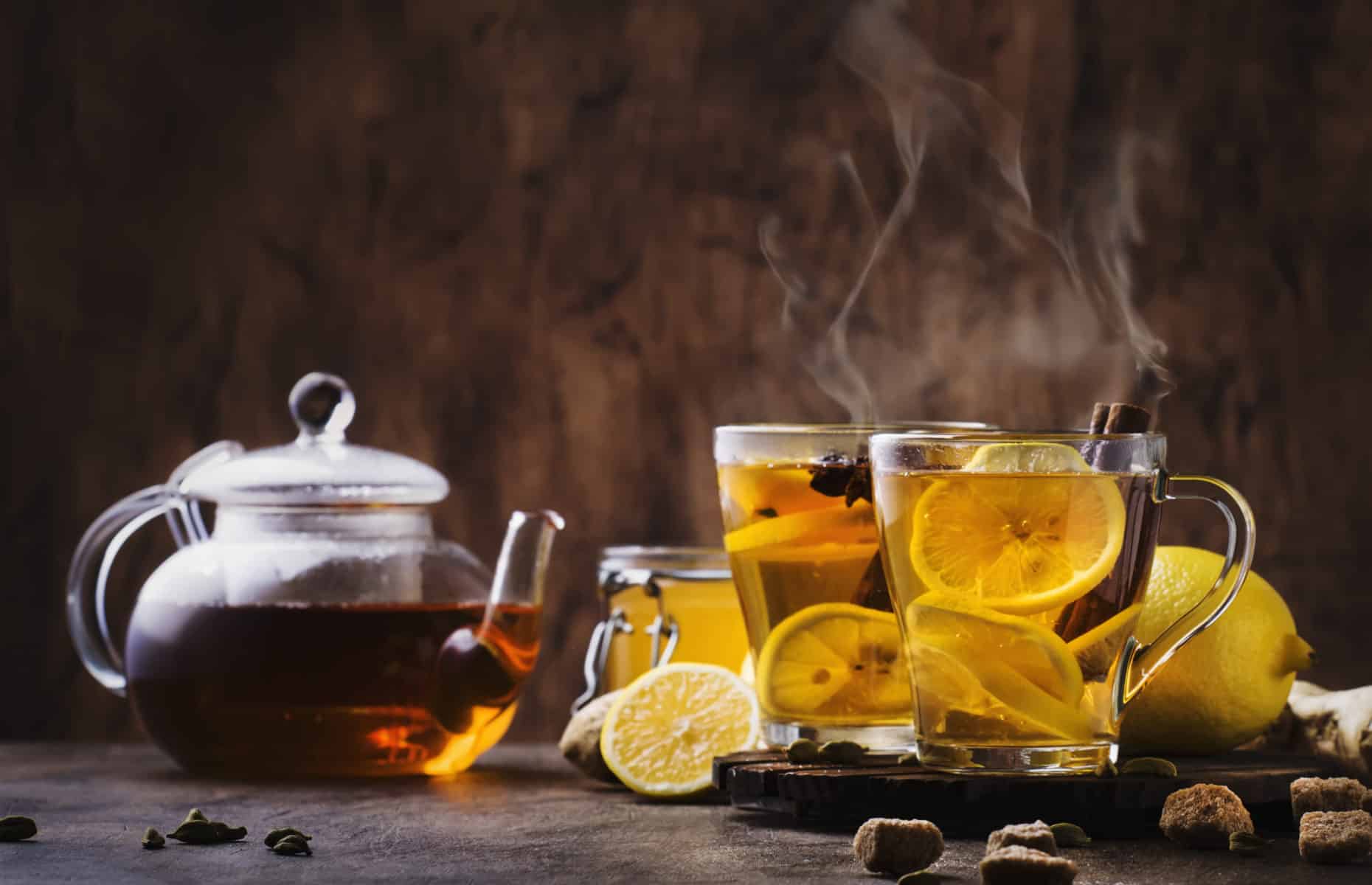 Winter or autumn hot healing tea with ginger, honey, lemon and s