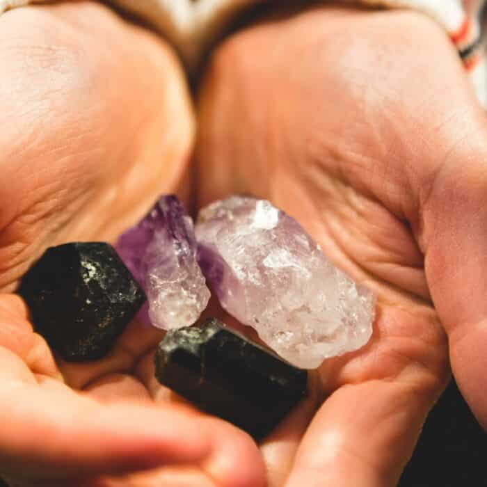Hands holding beautiful crystals