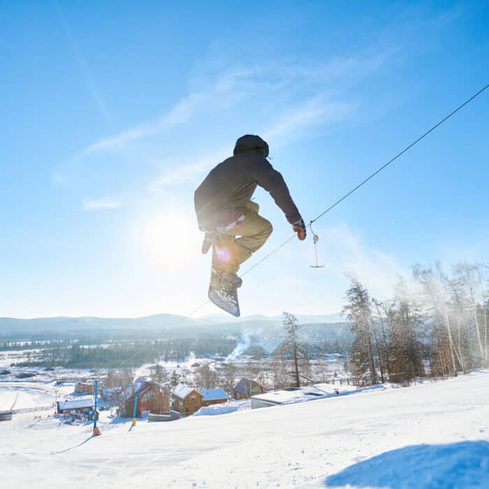 Snowboarder Jumping High