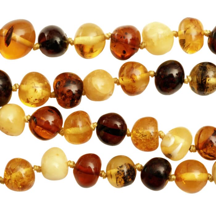 Amber beads necklace strands isolated