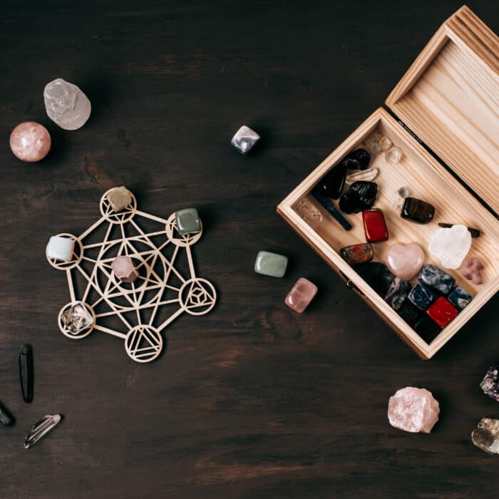 Healing chakra crystal grid therapy. Rituals with gemstones and aromatherapy for wellness, healing, meditation, destress, relaxation, mental health, spiritual practices. Energetical power concept