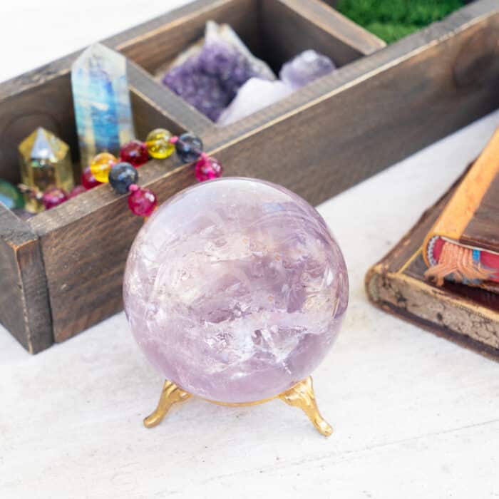 Gemstones set for relax and meditation. Magic ball made of Amestist stone and minerals for Reiki life balance, healing Crystal Ritual, Witchcraft, spiritual esoteric practice.
