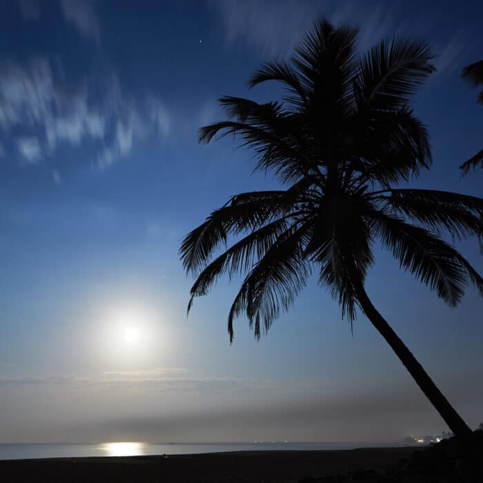 Night photo with full moon above sea in Sri Lanka.