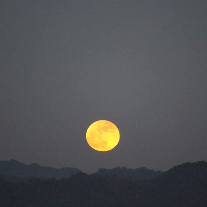 Full moon above the mountains