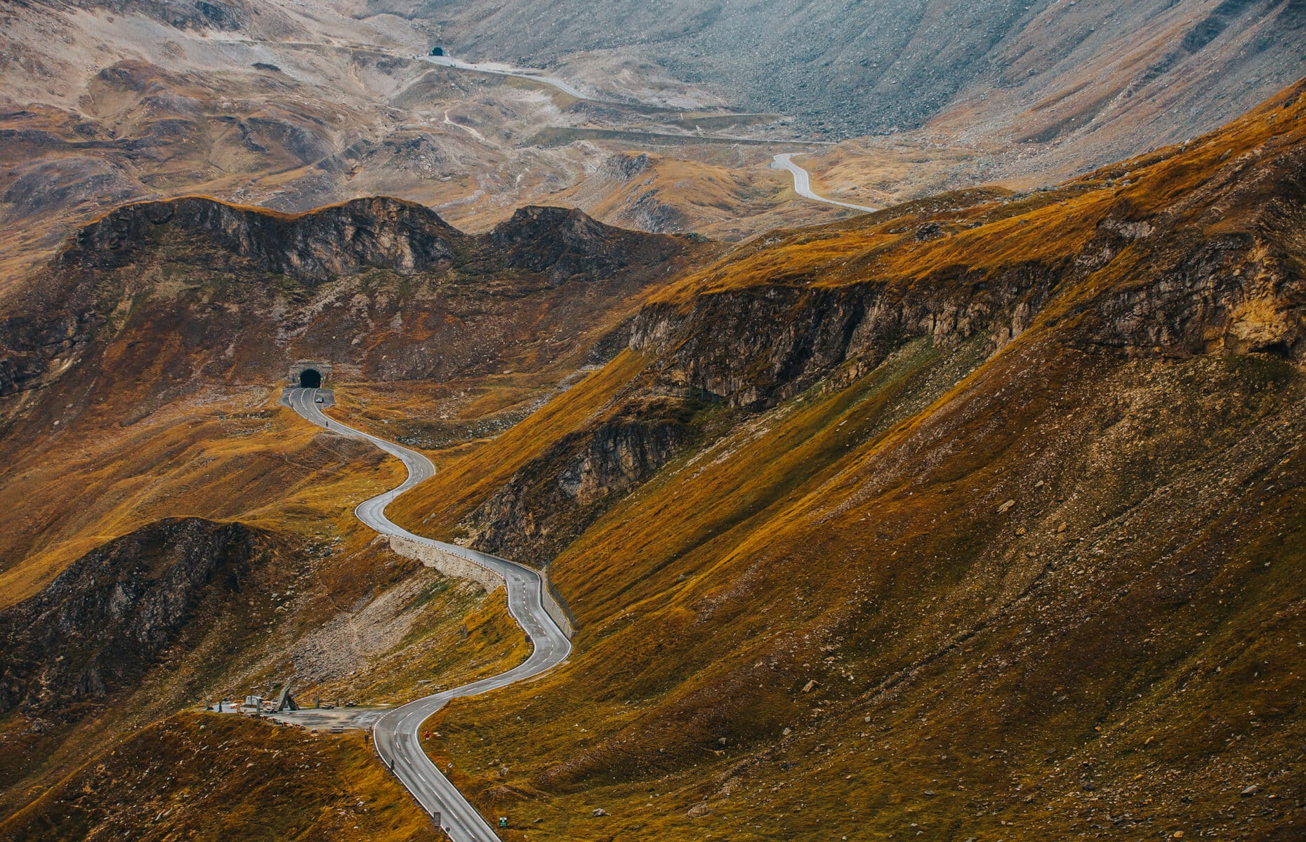 Beautiful landscape from the Grossglockner National Park Hohe Tauern, Austria. Alpine road in autumn and foggy weather.