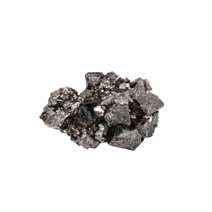 Closeup of sample of natural mineral from geological collection - raw crystalline Magnetite (lodestone, iron ore) rock isolated on white background