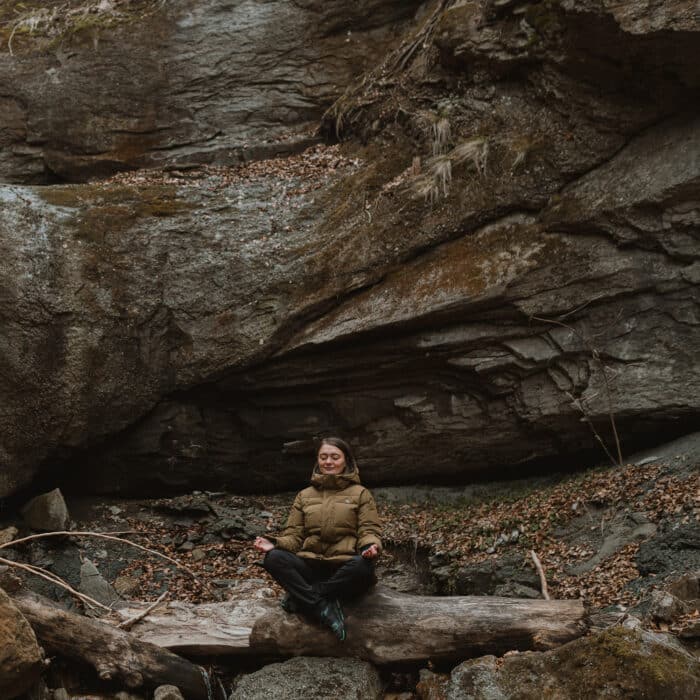 Woman practicing meditation in nature