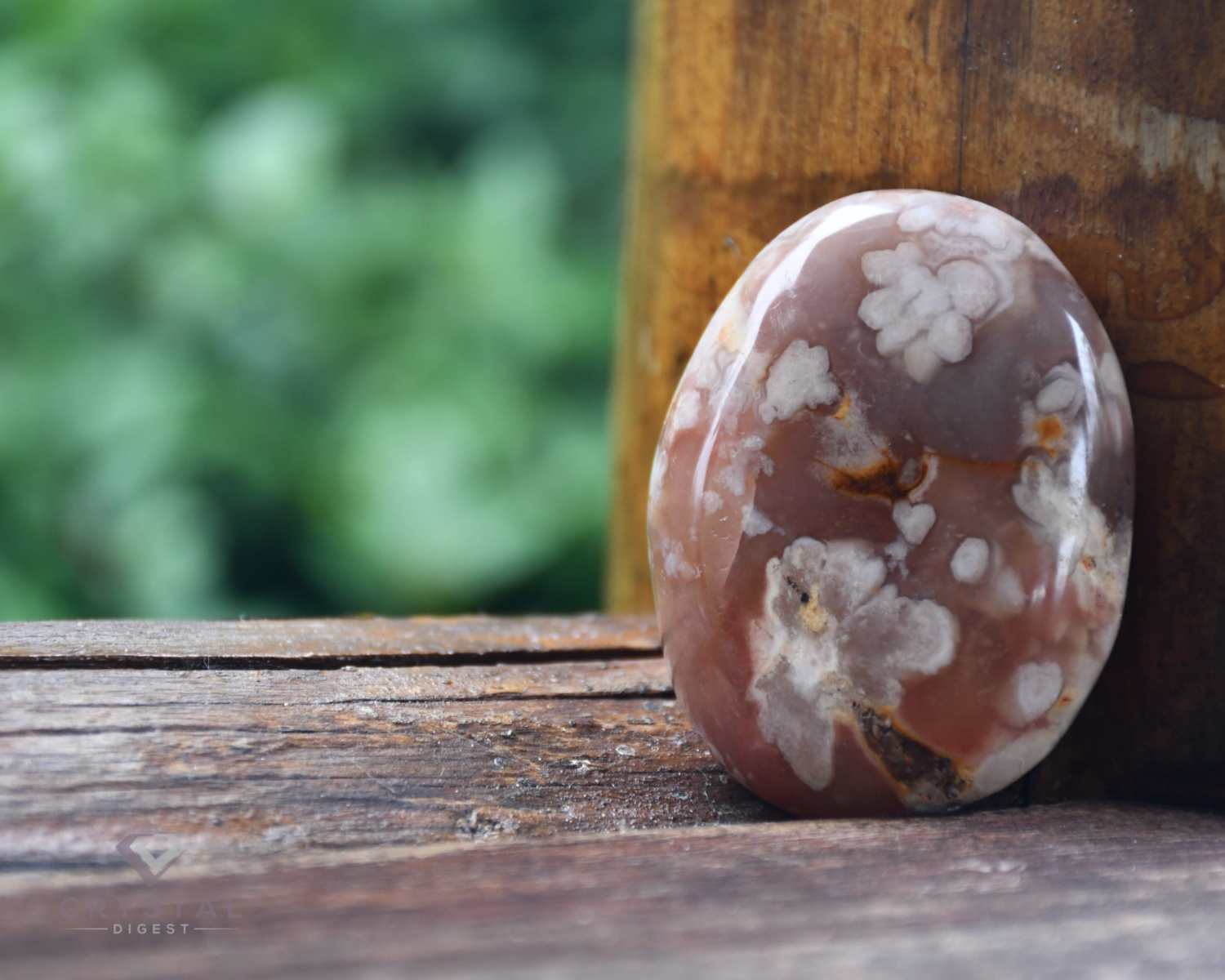 Flower agate crystal on a wooden window sill