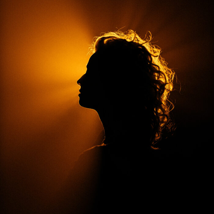 Woman silhouette shadows light dark